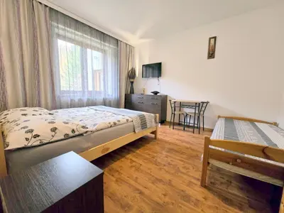 Łóżko lub łóżka w pokoju w obiekcie Noclegi u Belli