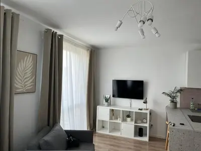 Telewizja i/lub zestaw kina domowego w obiekcie Apartamenty Lubin