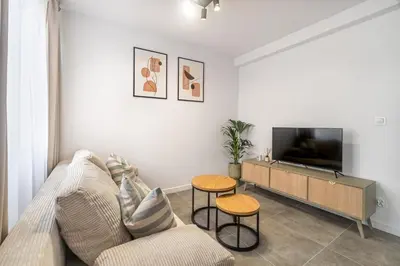 Telewizja i/lub zestaw kina domowego w obiekcie Apartament w centrum PW Invest Home