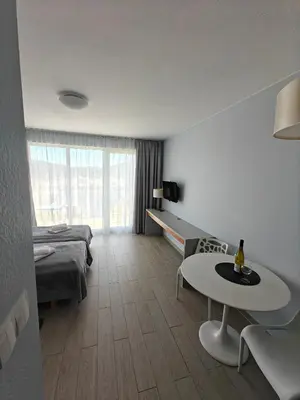 Łóżko lub łóżka w pokoju w obiekcie Apartament MERCURY