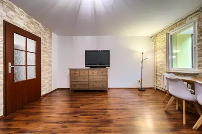 Telewizja i/lub zestaw kina domowego w obiekcie Wyspa Słodowa Apartment for 8 People by BookingHost
