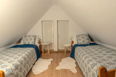 Łóżko lub łóżka w pokoju w obiekcie Bukowe Zacisze