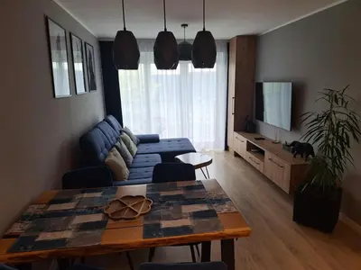 Część wypoczynkowa w obiekcie Komfortowy apartament dla 7 osób CH Arena, prywatny parking