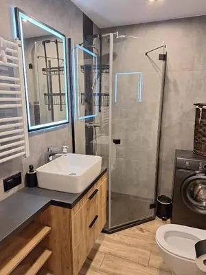 Łazienka w obiekcie Komfortowy apartament dla 7 osób CH Arena, prywatny parking