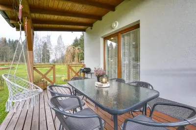 Balkon lub taras w obiekcie Domki Brzozowy Zakątek