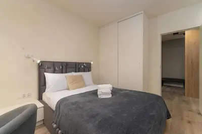 Łóżko lub łóżka w pokoju w obiekcie Wichrowa Deluxe Apartment by BookingHost