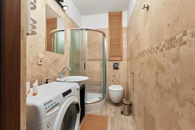 Łazienka w obiekcie Rynek Apartment The Heart of the City by Noclegi Renters