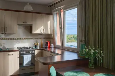 Kuchnia lub aneks kuchenny w obiekcie Zielony apartament w centrum