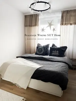 Łóżko lub łóżka w pokoju w obiekcie Apartament premium z widokiem na miasto