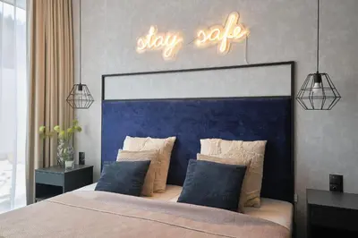 Łóżko lub łóżka w pokoju w obiekcie Apartament z aneksem kuchennym Crystal Pine - Biała Perła - Czarna Góra Resort