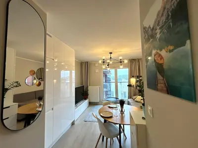 Telewizja i/lub zestaw kina domowego w obiekcie Apartament Halo 3 Check in 24h Privat Parking