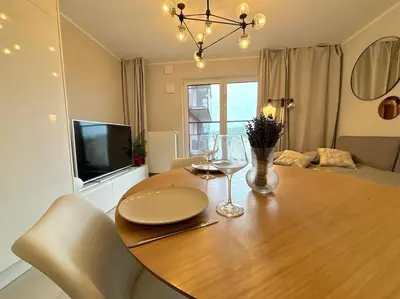 Telewizja i/lub zestaw kina domowego w obiekcie Apartament Halo 3 Check in 24h Privat Parking