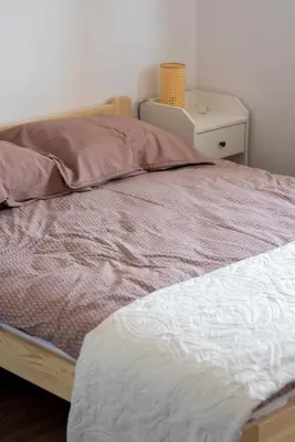 Łóżko lub łóżka w pokoju w obiekcie Apartament Kama