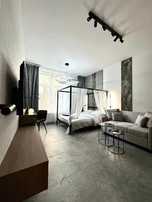 Łóżko lub łóżka w pokoju w obiekcie Dubois Apartment - Self Check-In 20h