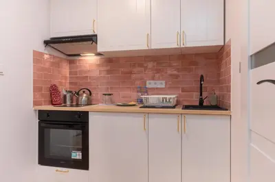 Kuchnia lub aneks kuchenny w obiekcie Rynek Wrocław Comfy Apartment