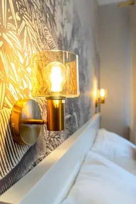 Łóżko lub łóżka w pokoju w obiekcie Apartamenty blisko centrum - ProperUNIT