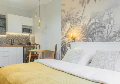 Łóżko lub łóżka w pokoju w obiekcie Apartamenty blisko centrum - ProperUNIT