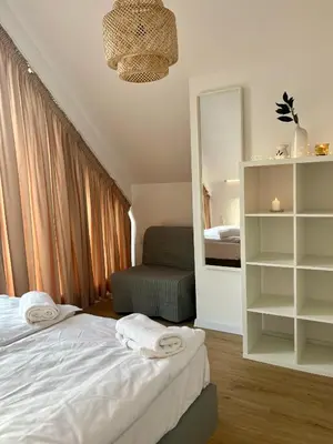Łóżko lub łóżka w pokoju w obiekcie Domki Granero w Górach Sowich