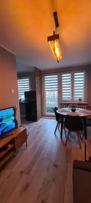 Telewizja i/lub zestaw kina domowego w obiekcie Apartament Retro