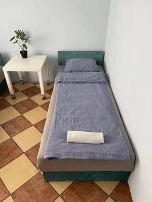 Łóżko lub łóżka w pokoju w obiekcie Wiejska Chata w Doline Baryczy