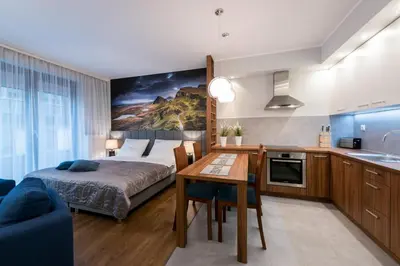 Kuchnia lub aneks kuchenny w obiekcie Exclusive Apartments Wroclaw City Centre