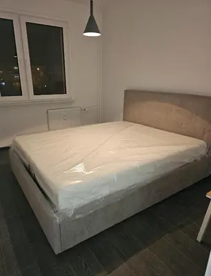 Łóżko lub łóżka w pokoju w obiekcie Apartament Marcello Teczowe 8B 8
