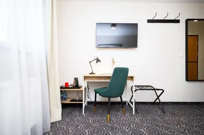 Telewizja i/lub zestaw kina domowego w obiekcie Hotel ARDEN