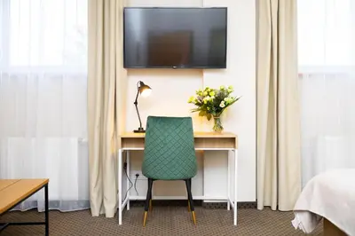Telewizja i/lub zestaw kina domowego w obiekcie Hotel ARDEN
