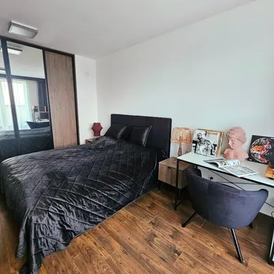 Łóżko lub łóżka w pokoju w obiekcie Apartament Wrocław Promenady