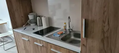 Kuchnia lub aneks kuchenny w obiekcie Aparthotel Apartamenty Czarna Góra 131
