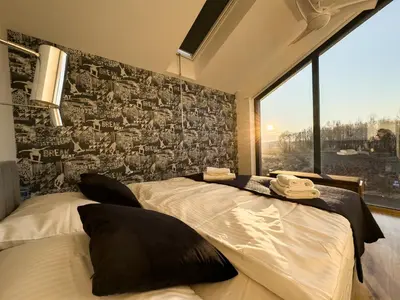 Łóżko lub łóżka w pokoju w obiekcie Loft Śnieżnik