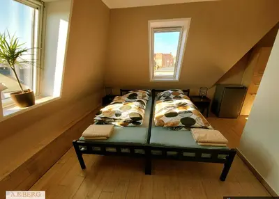 Łóżko lub łóżka w pokoju w obiekcie AE Berg