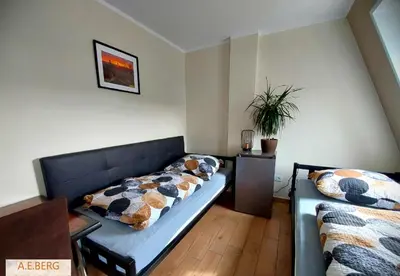 Łóżko lub łóżka w pokoju w obiekcie AE Berg