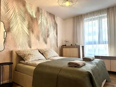 Łóżko lub łóżka w pokoju w obiekcie Nyska Apartment - Self Check-In 20h - Parking & Lift