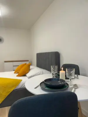 Łóżko lub łóżka w pokoju w obiekcie Luxury Apartments Kamienna Góra