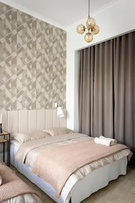 Łóżko lub łóżka w pokoju w obiekcie Magnolia 1