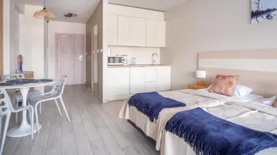 Łóżko lub łóżka w pokoju w obiekcie Apartament Górski z Widokiem 