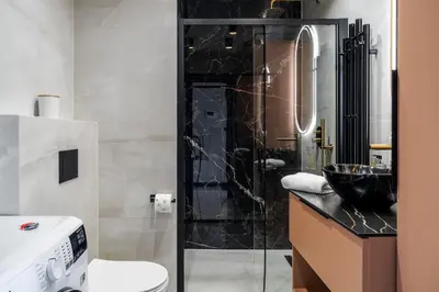 Łazienka w obiekcie RentPlanet - Apartamenty Quorum