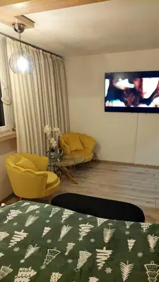 Telewizja i/lub zestaw kina domowego w obiekcie Elegancki Apartament w Centrum Miasta P&P