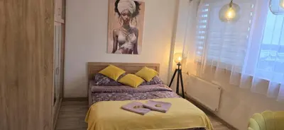 Łóżko lub łóżka w pokoju w obiekcie Elegancki Apartament w Centrum Miasta P&P