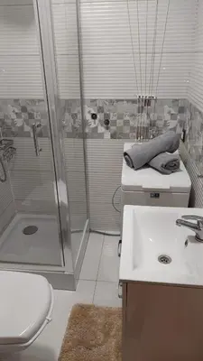 Łazienka w obiekcie Elegancki Apartament w Centrum Miasta P&P