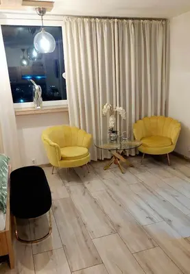 Część wypoczynkowa w obiekcie Elegancki Apartament w Centrum Miasta P&P