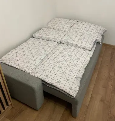 Łóżko lub łóżka w pokoju w obiekcie Apartament Olesno Centrum
