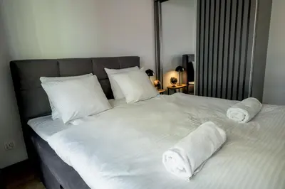Łóżko lub łóżka w pokoju w obiekcie RentPlanet - Apartamenty Czysta