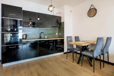 Kuchnia lub aneks kuchenny w obiekcie RentPlanet - Apartamenty Czysta