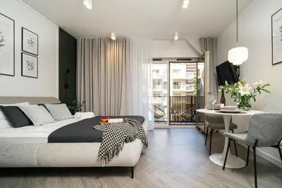 Łóżko lub łóżka w pokoju w obiekcie Kwintesencja wygody w Centrum apartamenty 26 i 63 by Apartamenty na dni Wrocław