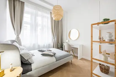 Łóżko lub łóżka w pokoju w obiekcie Apartament Botanique