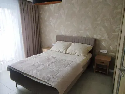 Łóżko lub łóżka w pokoju w obiekcie Czarno biały