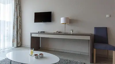 Telewizja i/lub zestaw kina domowego w obiekcie VacationClub - Tignes Apartament 22