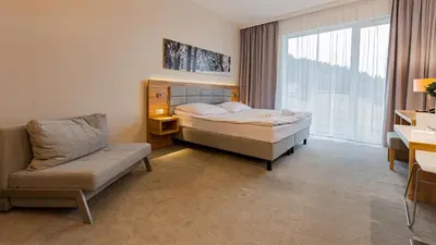 Łóżko lub łóżka w pokoju w obiekcie VacationClub - Aparthotel Czarna Góra Apartament 219